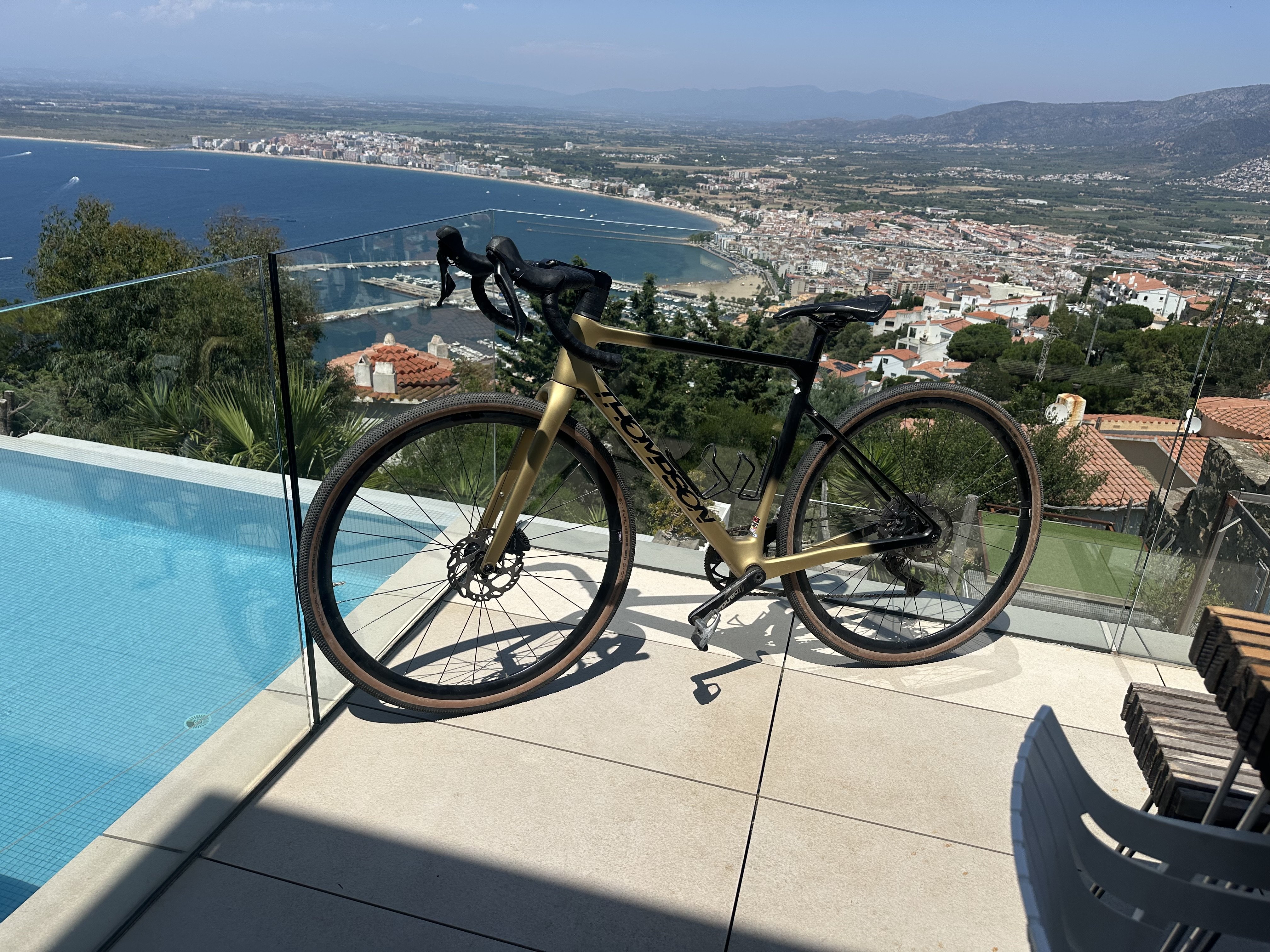 Bike on the Casa23 terrace with Bay of Roses view